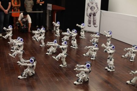 Dance Dance Revolution: 20 Robots Think They Can Dance